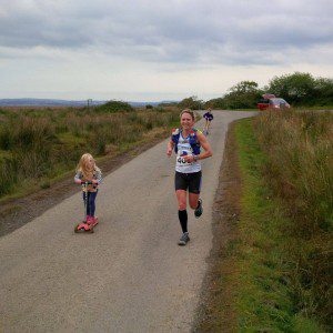 Michelle Maxwell with daughter on scooter in the Gower 50 Ultra